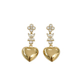 Orecchino cuore riflesso