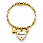 Bracciale Calamita con ciondolo a cuore e frase "Rilassati", color oro