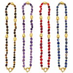 Collana Incantesimo con pietre colorate, varianti marrone, viola, rosso e blu